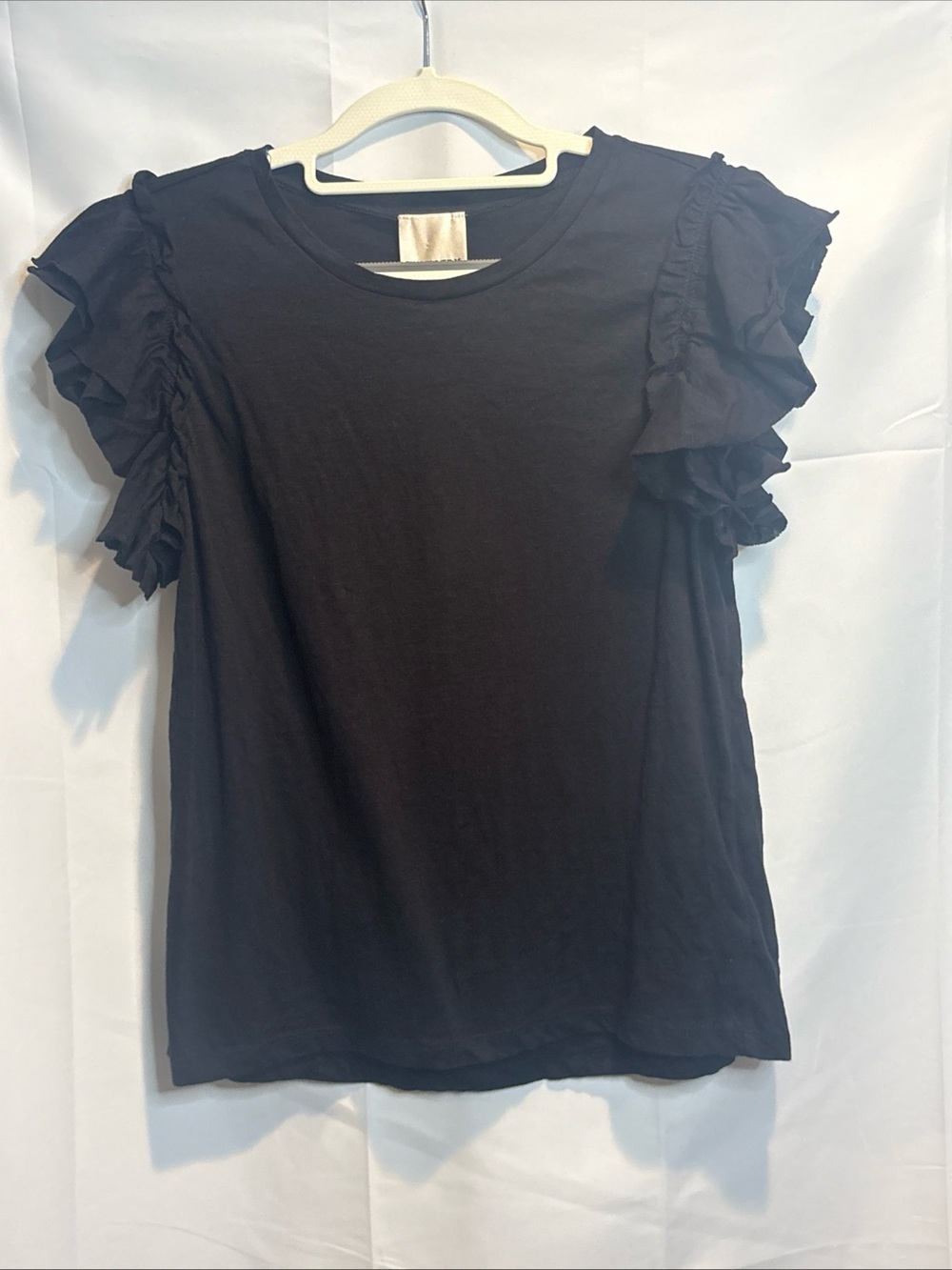 Black Short-Sleeve Ruffle Tee - Women